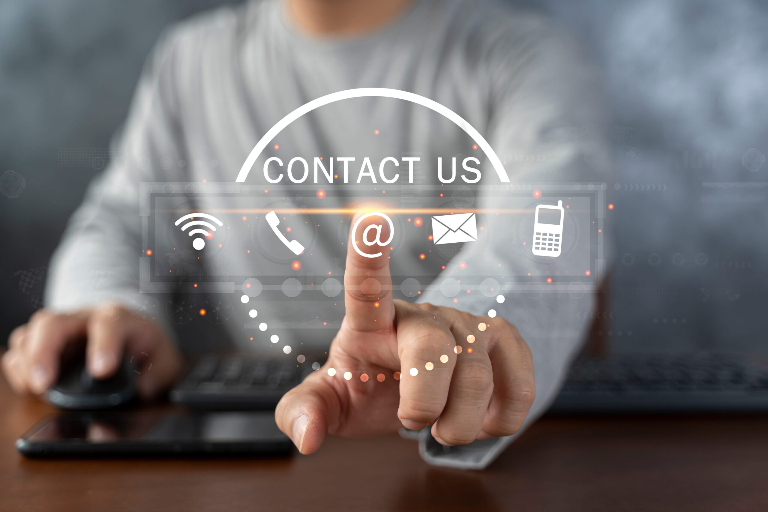 contact us customer support hotline people connect businessman using laptop touching virtual screen contact icons 1 scaled 1